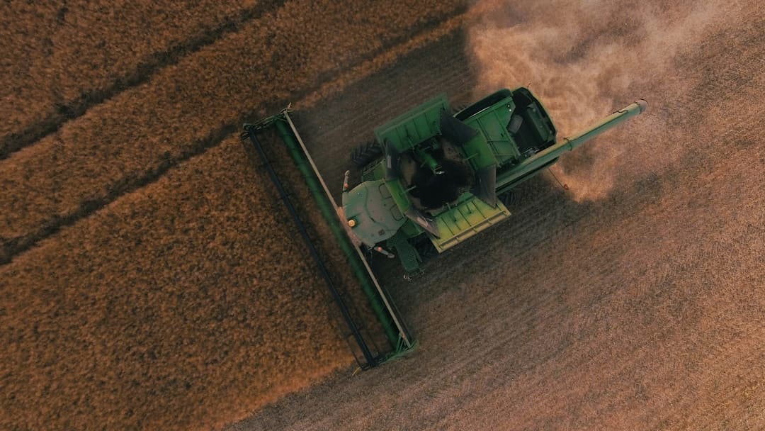 Drone flying over agricultural field